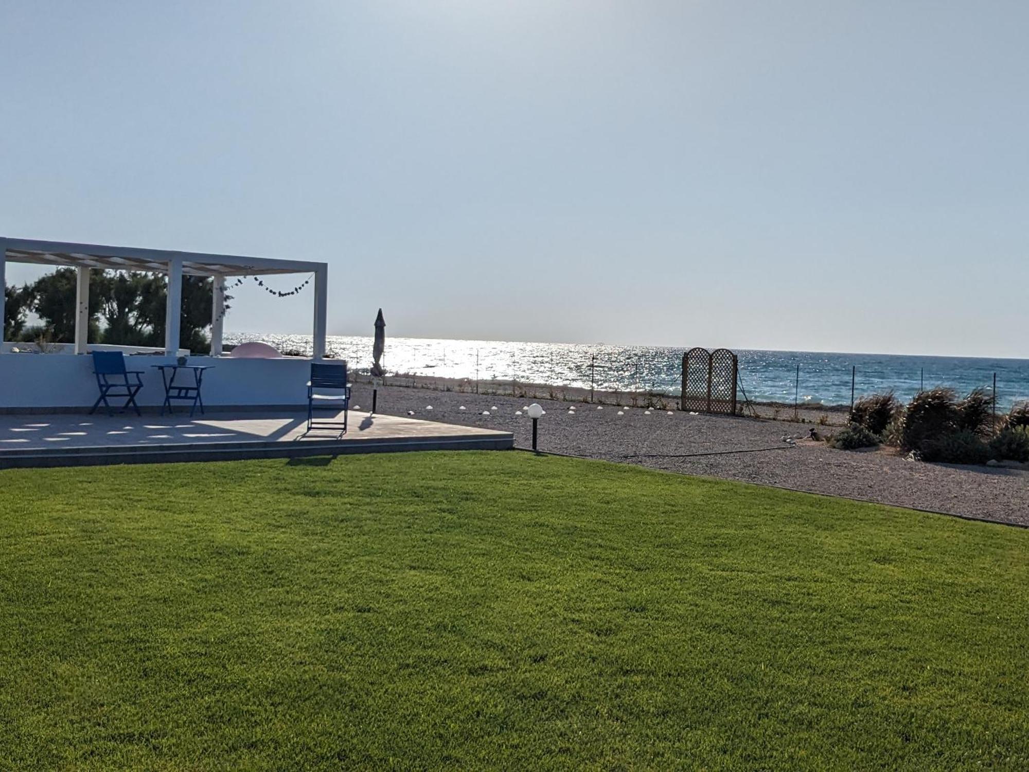 Lambou Beach Sunset Soroni Ngoại thất bức ảnh